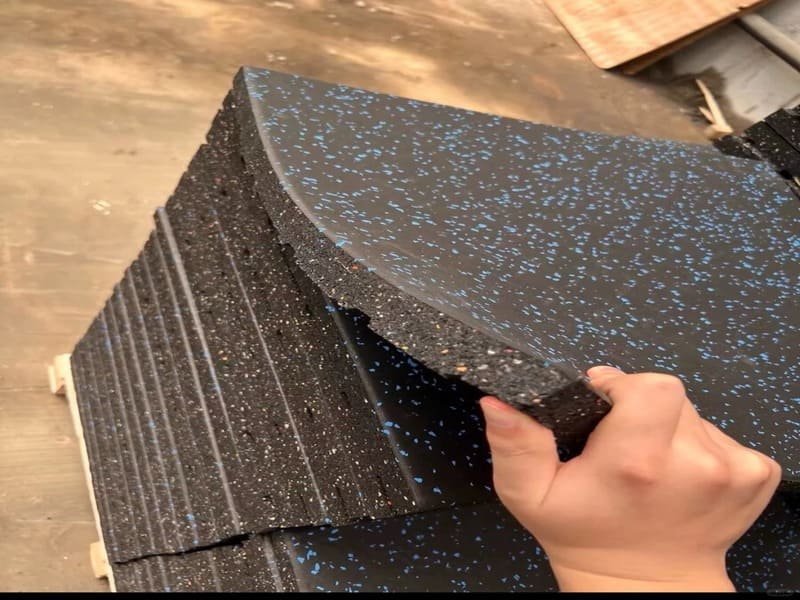 Lab technician testing underlayment sound insulation ratings